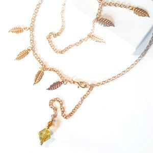 Gold Feather Pendant Necklace And Bracelet